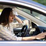 Exhausted,Young,Woman,Suffering,From,Heat,Inside,Car,With,Broken