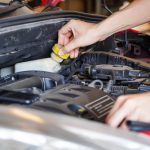 Asian,Technicians,Inspect,Brake,Fluid,For,Engine,Compartment,Care,And